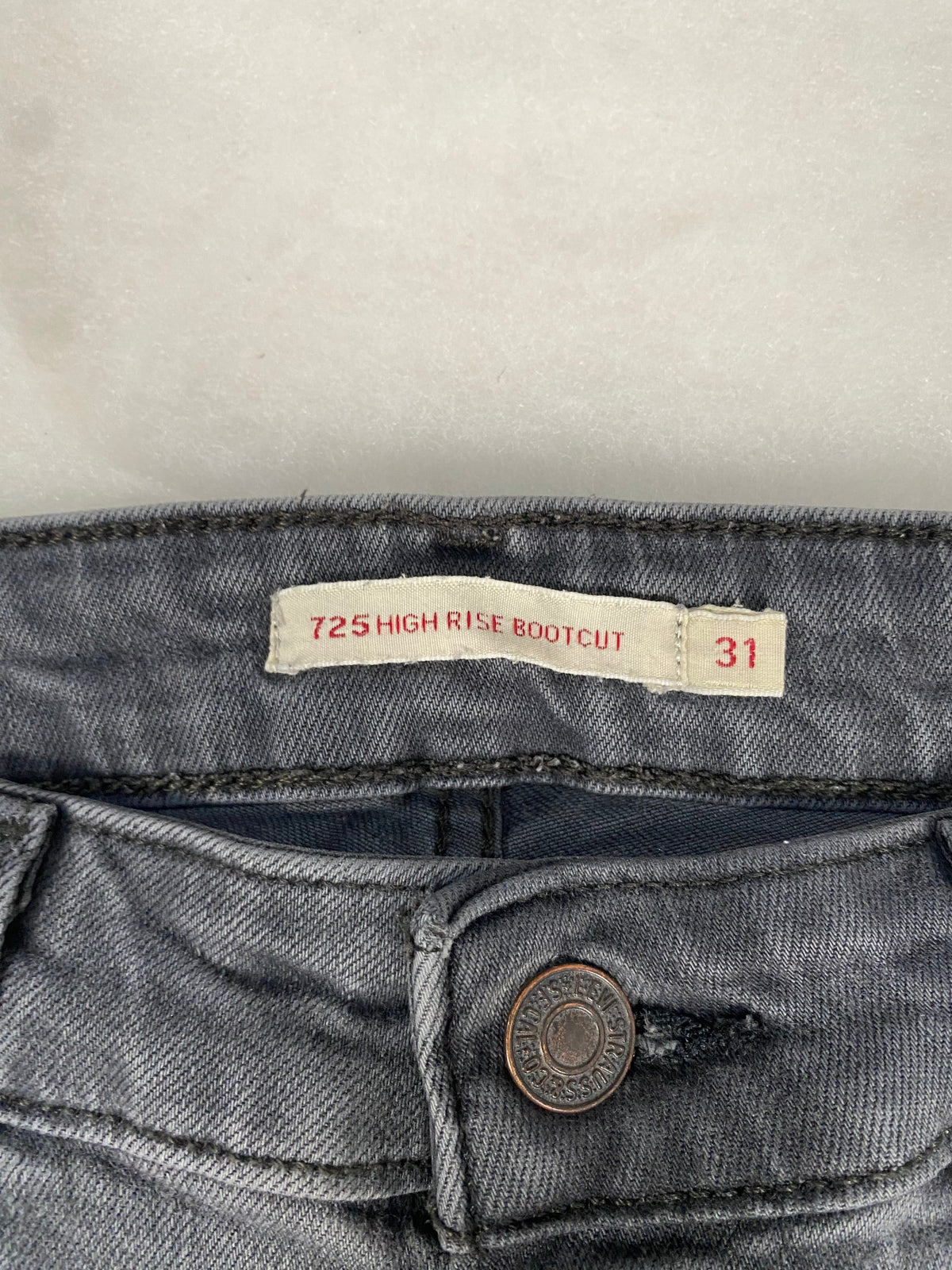 Jeans Levi's 725 High Rise Bootcut cartellino