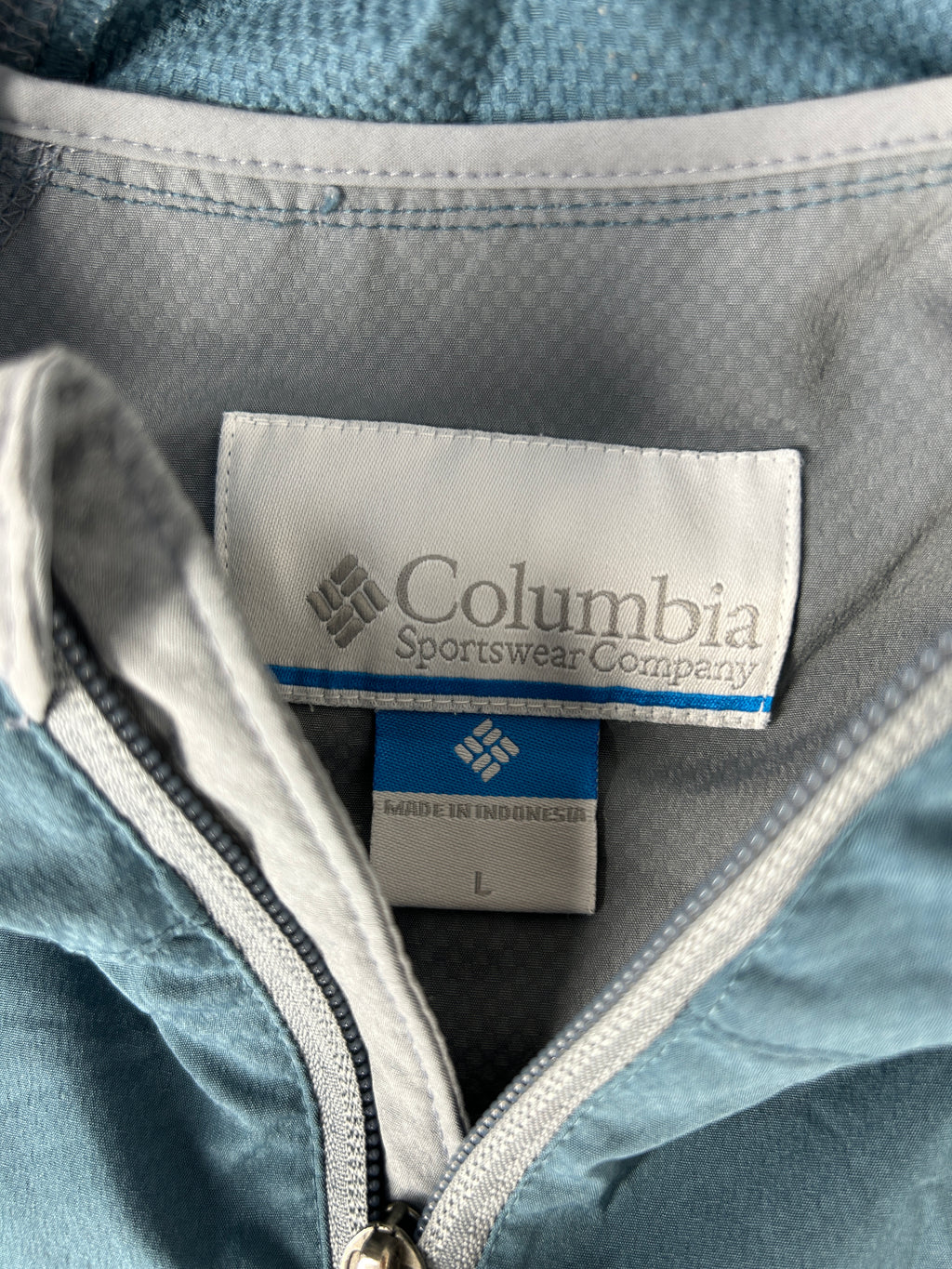 Giacca a vento Columbia azzurra e grigia – Uomo Taglia L