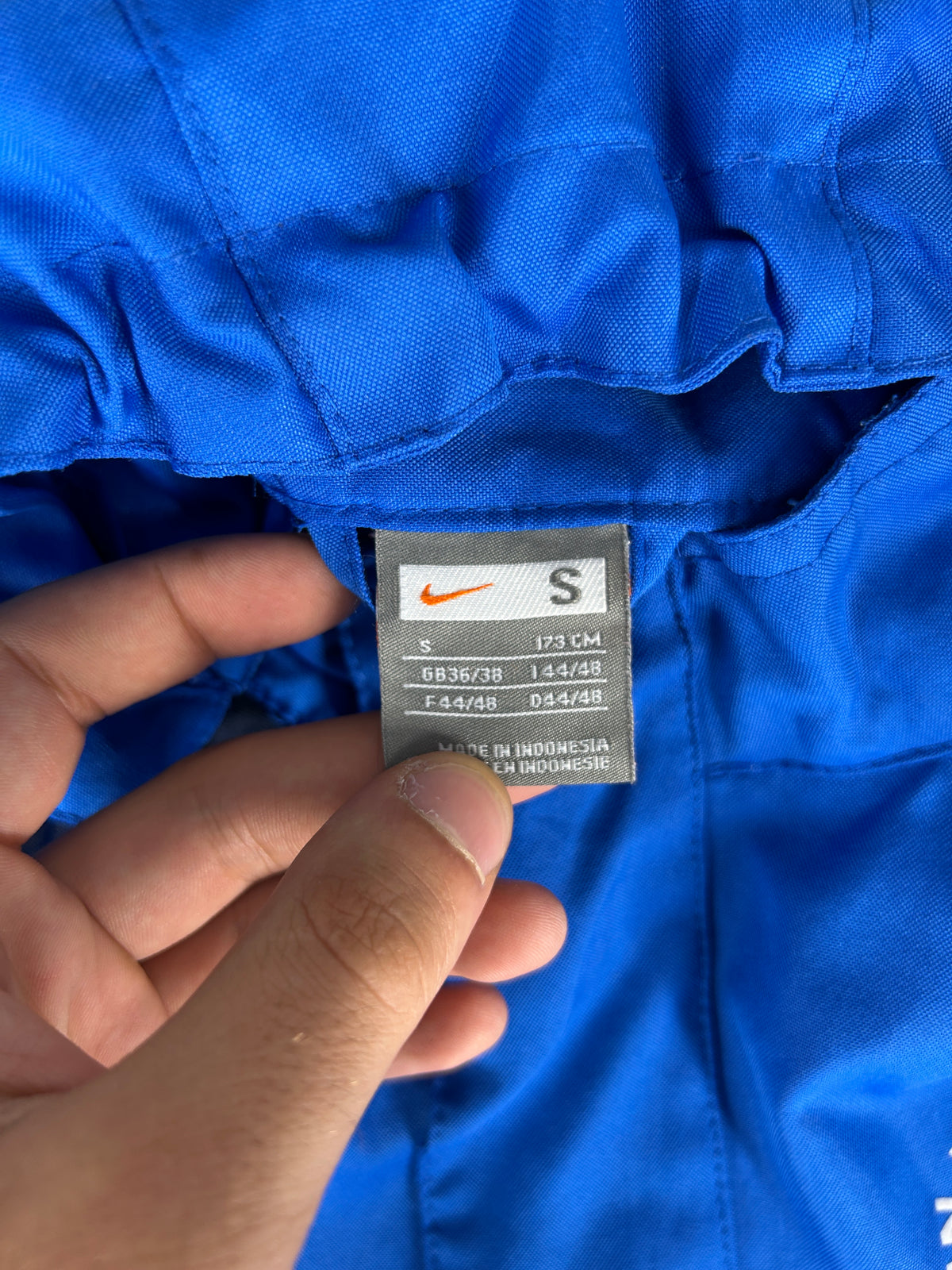 Giacca a vento Nike blu royal con cappuccio – Uomo Taglia S