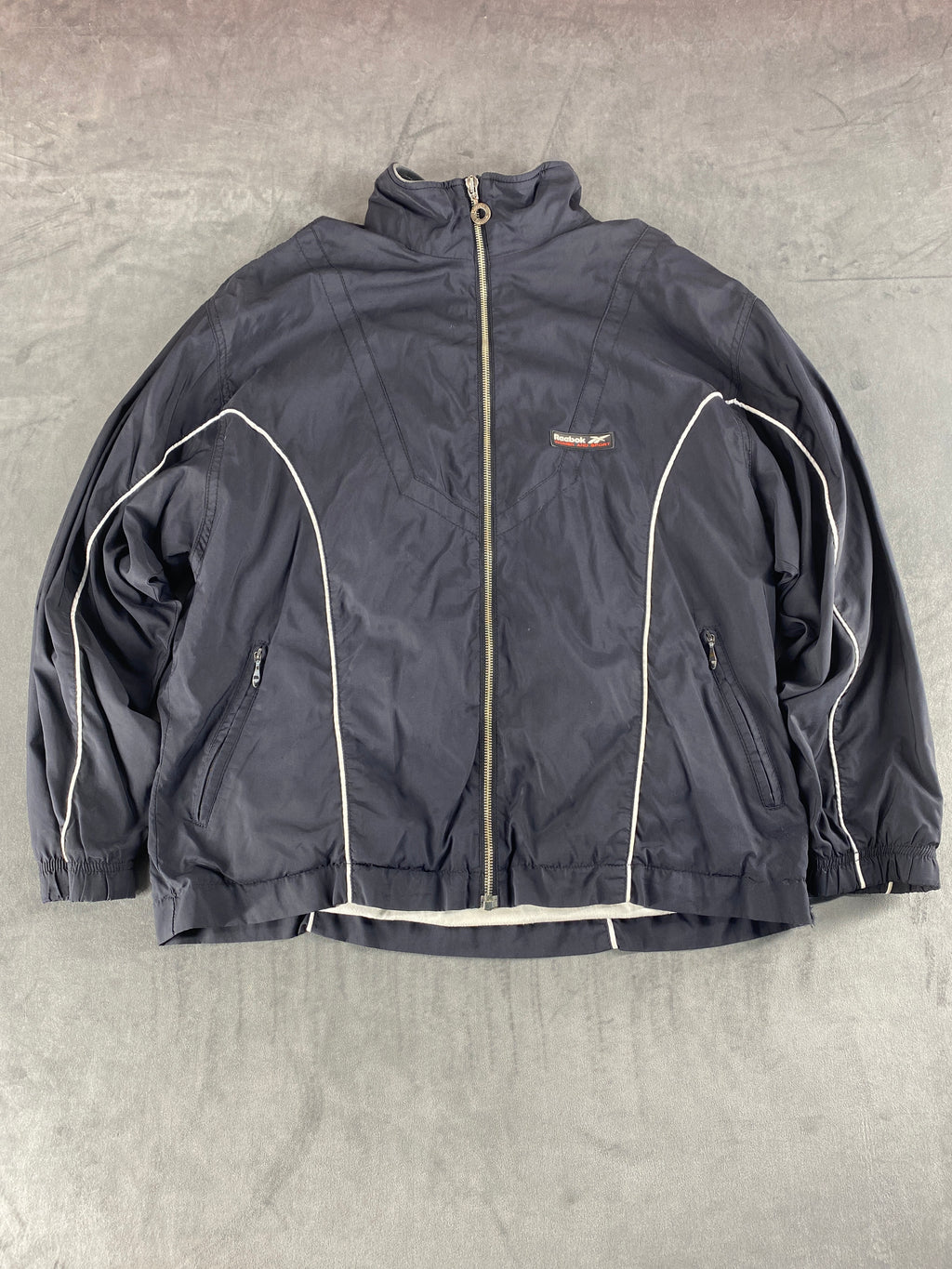 Giacca a vento Reebok grigio scuro – Donna Taglia L