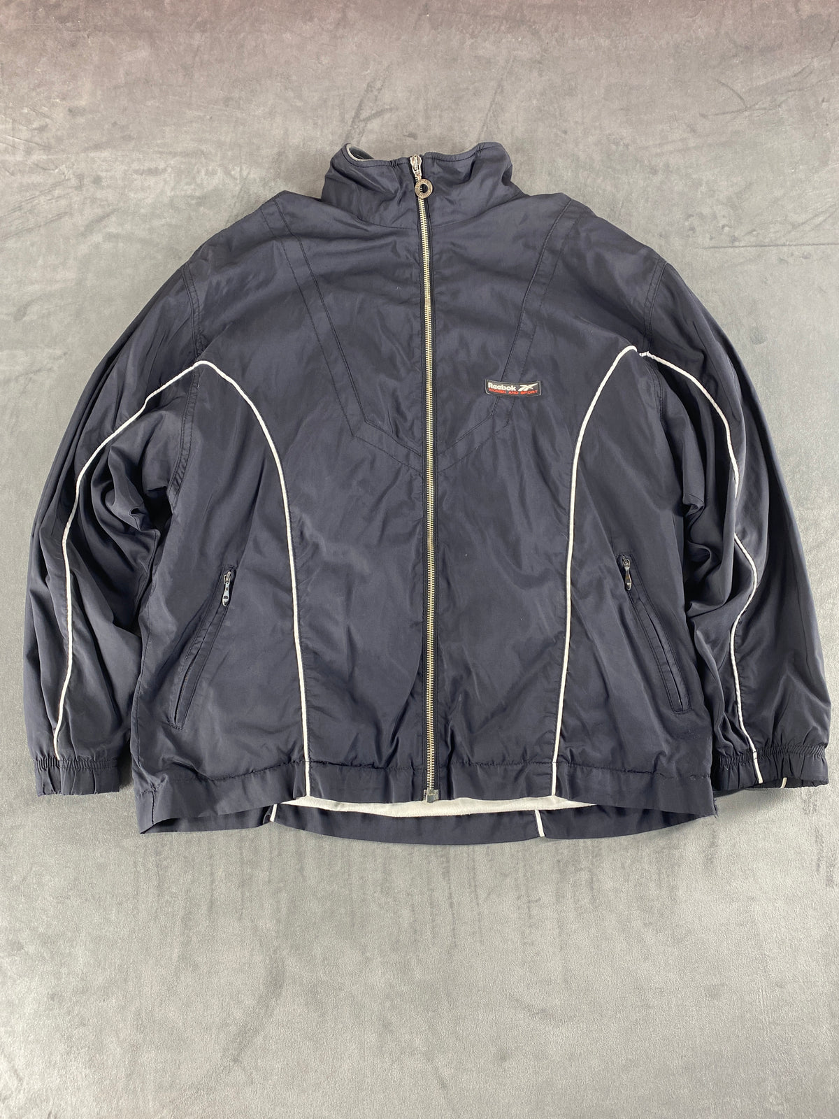 Giacca a vento Reebok grigio scuro – Donna Taglia L