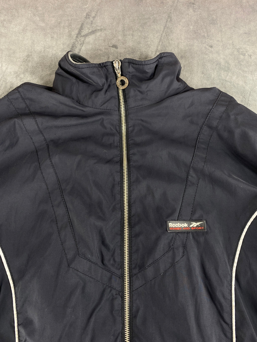 Giacca a vento Reebok grigio scuro – Donna Taglia L