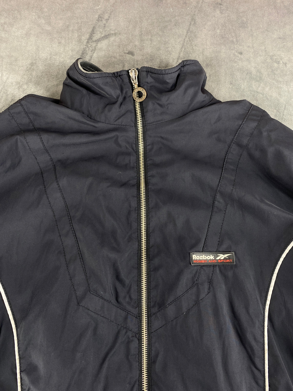 Giacca a vento Reebok grigio scuro – Donna Taglia L