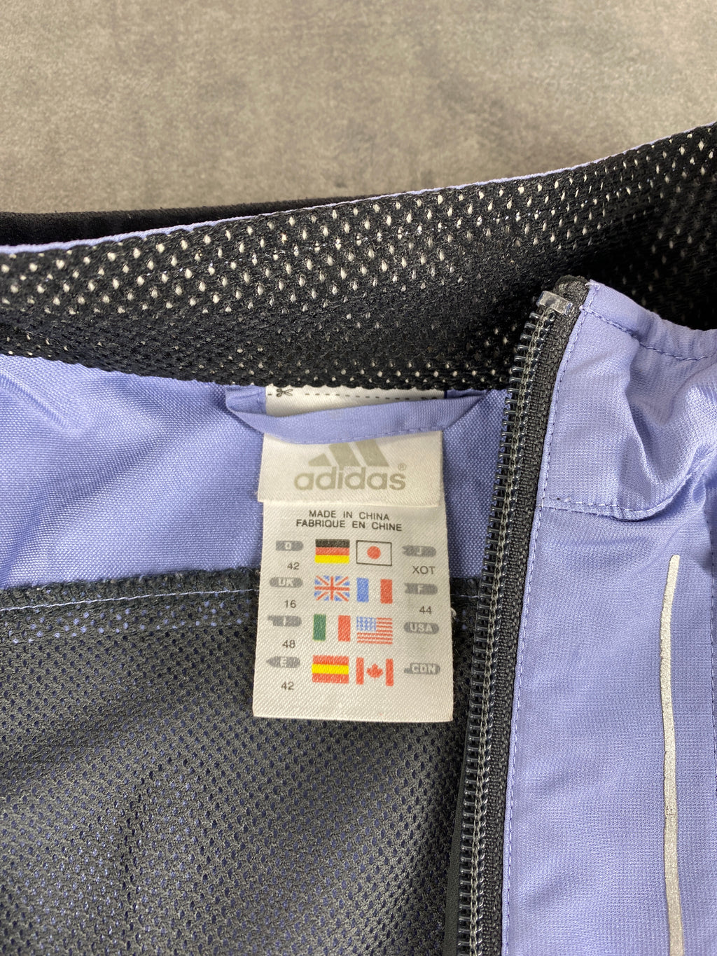 Giacca a vento Adidas lilla e grigia – Donna Taglia L