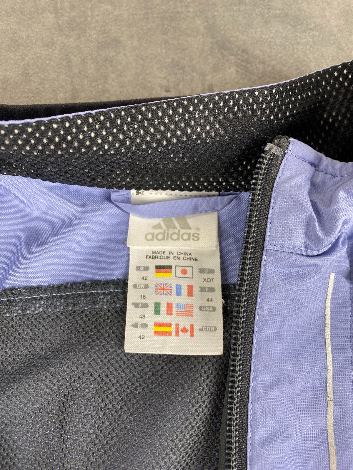 Giacca a vento Adidas lilla e grigia – Donna Taglia L