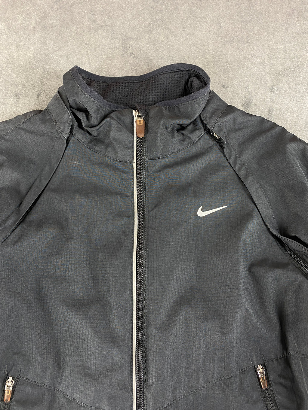 Giacca a vento Nike grigio scuro Dri-Fit – Donna Taglia M