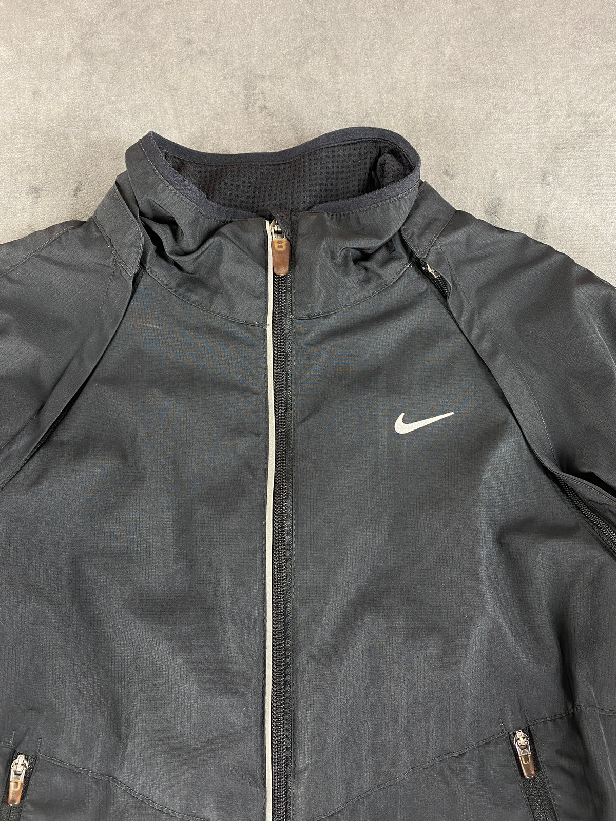Giacca a vento Nike grigio scuro Dri-Fit – Donna Taglia M