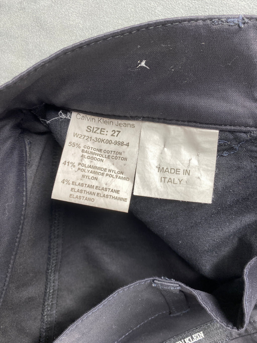 Pantaloni Calvin Klein Jeans grigio scuro con zip – Donna Taglia S (W27)